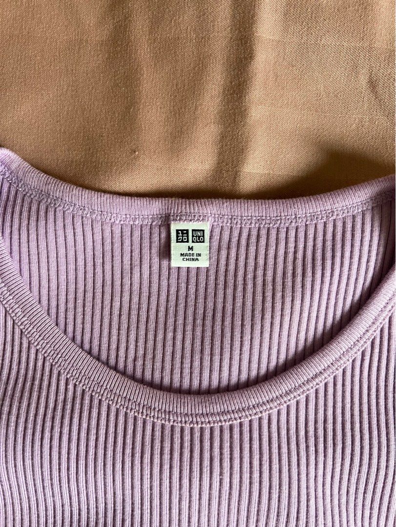 UNIQLO Ribbed Crop Top (Category: Blouses) located in Caloocan City. Submitted by dmdmp (Listing ID 1336697864, Image 2). Description: Purple ribbed croptop Size M.