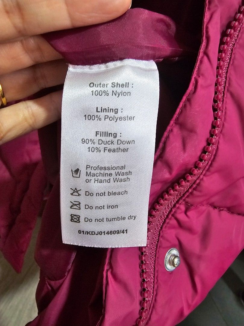 Winter Jacket (Category: Babies & Kids Fashion) located in Singapore. Submitted by tanst18 (Listing ID 1336754444, Image 2). Description: Worn only once and kept my girl warm during winter. ColdWear M sized bought from Singapore shop direct, waterproof nylon outer shell, 90% duck down - see material label in photo for full details. Shoulder to waist length: 60cm, Chest width: 38cm, Sleeve length: 45cm. Fits 8yr to 10 yr old girl..