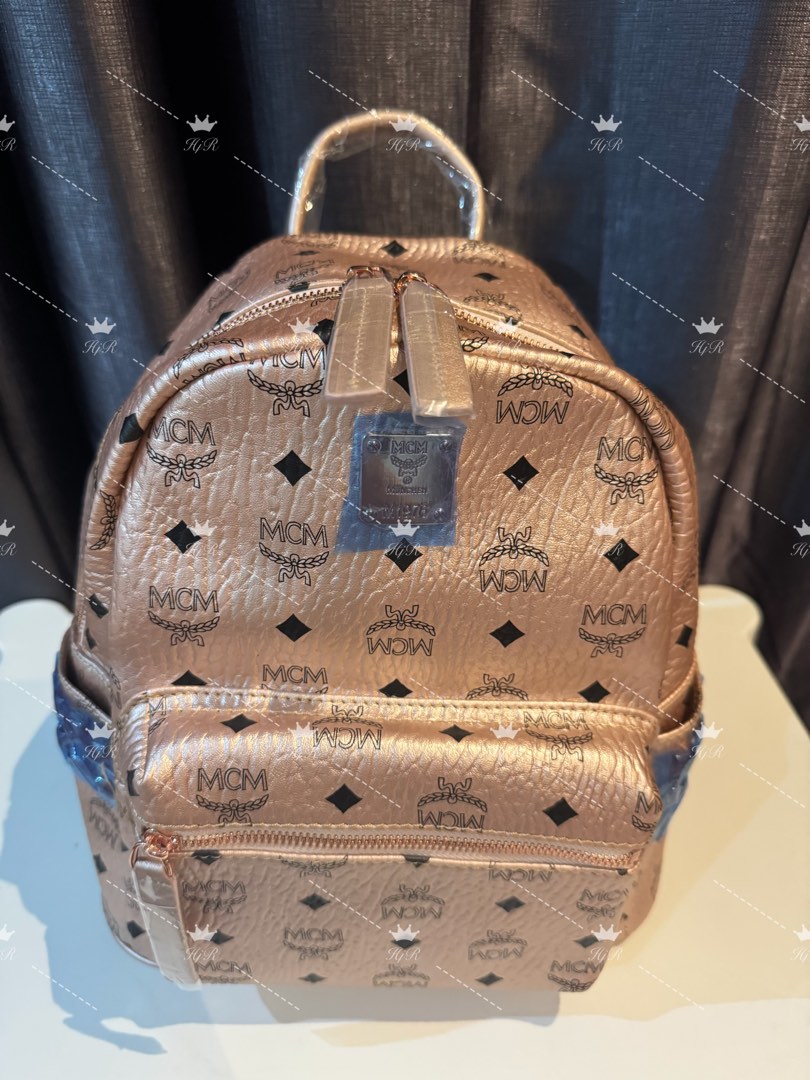 Mcm champagne gold backpack 2025