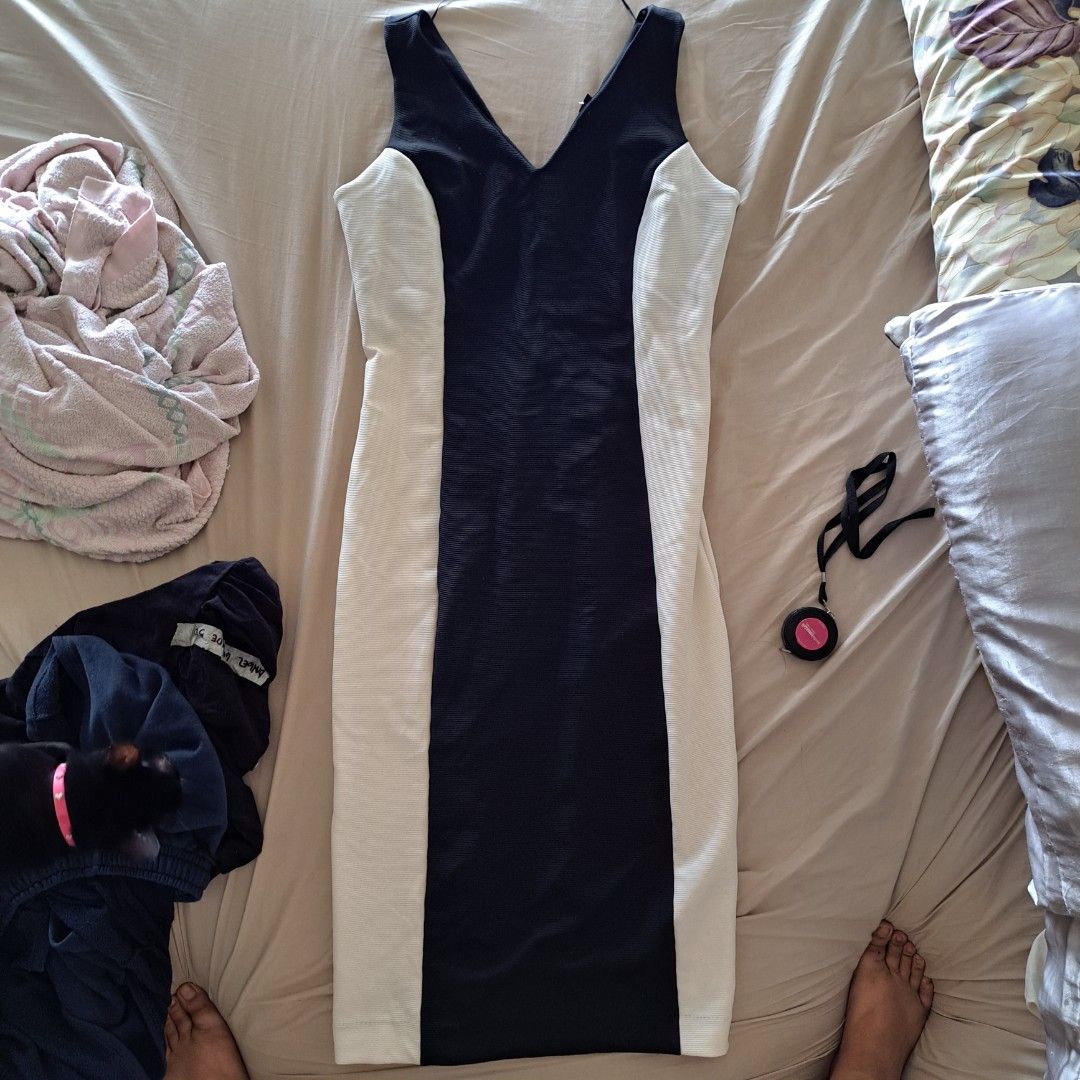 Black and White Sheath Dress (Category: Dresses) located in Quezon City. Submitted by lixire (Listing ID 1336890185, Image 1). Description: Unused but Stored CK Overrun: issues: storage stains as in the picture; just bleach that part. Color: Black White Fabric: Ribbed Measurements: Bust 38 in Waist - Slimmest 32 in Hip Widest -40 in.
