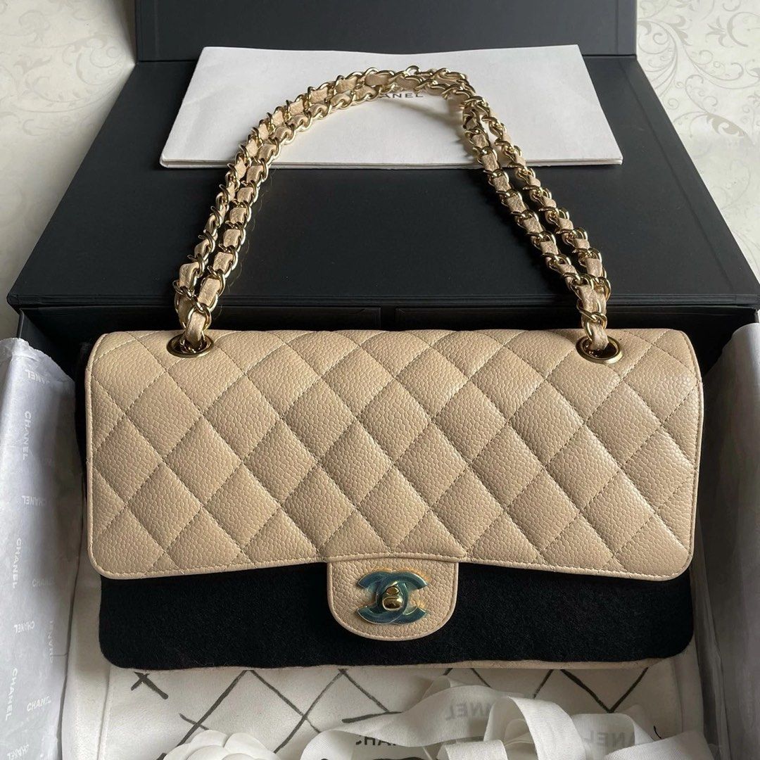 Chanel Classic Flap Medium (Category: Luxury Bags & Wallets) located in Quezon City. Submitted by __12345 (Listing ID 1336893680, Image 1). Description: - Preorder (2 weeks eta) - 9/10 condition - Beige, GHW - Series 14 - Includes dustbag, box, card, and authentication (via entrupy) - Available for meet up/delivery - Detailed photos available upon request - Guaranteed authentic or money back! Open to sourcing requests! Send us a message 💌🛍️.