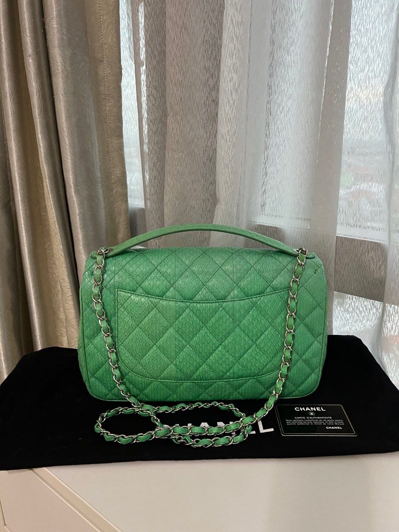 Chanel Mint Python Jumbo Flap Bag (Category: Bags & Wallets) located in Singapore. Submitted by ophelia_ll (Listing ID 1336993475, Image 3). Description: Like new condition. Silver hardware . Chanel Jumbo Python Flap bag. One and only piece in whole Singapore. Comes with Authenticity card and dustbag.