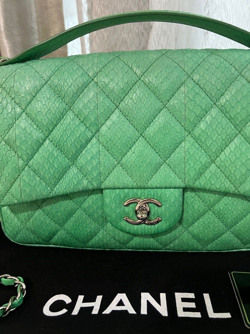Chanel Mint Python Jumbo Flap Bag (Category: Bags & Wallets) located in Singapore. Submitted by ophelia_ll (Listing ID 1336993475, Image 2). Description: Like new condition. Silver hardware . Chanel Jumbo Python Flap bag. One and only piece in whole Singapore. Comes with Authenticity card and dustbag.
