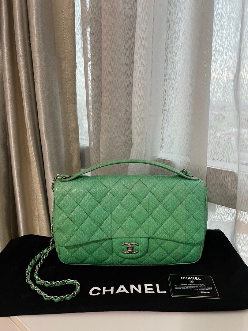 Chanel Mint Python Jumbo Flap Bag (Category: Bags & Wallets) located in Singapore. Submitted by ophelia_ll (Listing ID 1336993475, Image 1). Description: Like new condition. Silver hardware . Chanel Jumbo Python Flap bag. One and only piece in whole Singapore. Comes with Authenticity card and dustbag.