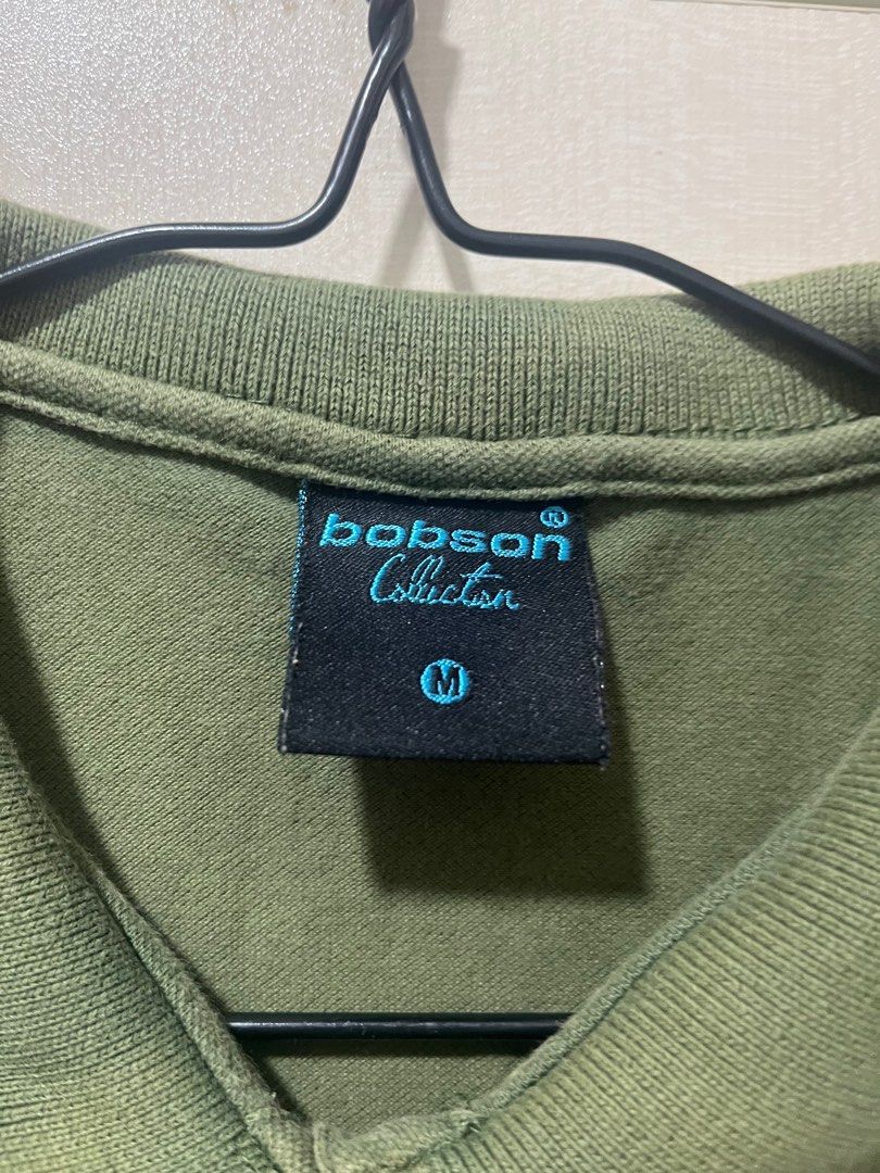 Dark Green Bobson Polo Shirt (Category: Shirts) located in Manila. Submitted by declutter.with.me. (Listing ID 1336944093, Image 3). Description: Has slight discoloration in collar part as seen in the photo. RFS: Decluttering .