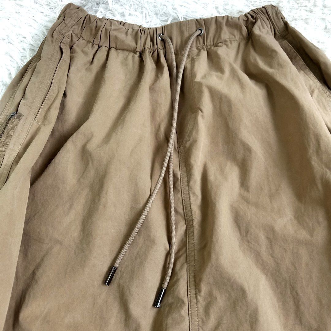 INITIAL Long maxi brown/toffee skirt (Category: Skirts) located in Dagupan City. Submitted by rlacyourstyle1794 (Listing ID 1309010327, Image 3). Description: wala pong issue s to l parachute ang tela.