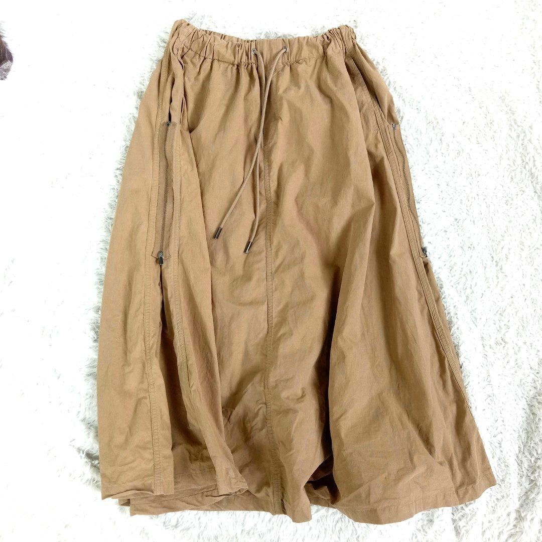INITIAL Long maxi brown/toffee skirt (Category: Skirts) located in Dagupan City. Submitted by rlacyourstyle1794 (Listing ID 1309010327, Image 2). Description: wala pong issue s to l parachute ang tela.