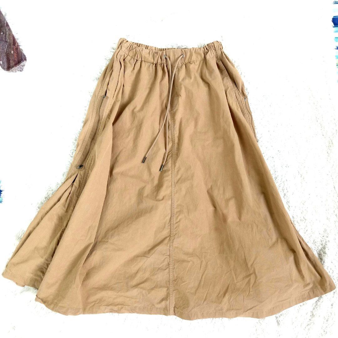 INITIAL Long maxi brown/toffee skirt (Category: Skirts) located in Dagupan City. Submitted by rlacyourstyle1794 (Listing ID 1309010327, Image 1). Description: wala pong issue s to l parachute ang tela.