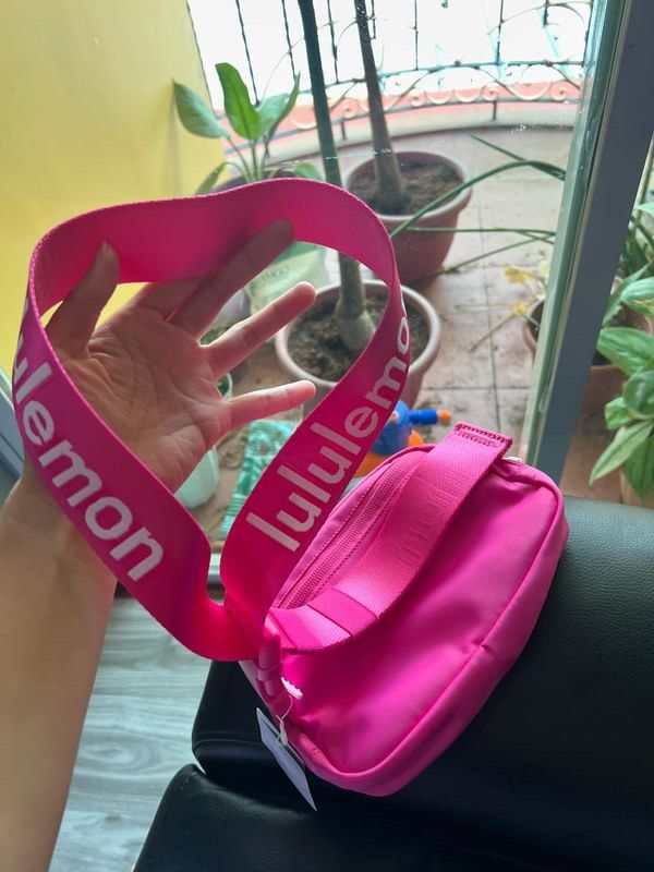Lululemon Belt Bag (Category: Cross-body Bags) located in Manila. Submitted by _rinaa (Listing ID 1336973319, Image 3). Description: Brandnew 1L Bag dimensions: 19cm x 5cm x 13cm (7.5” x 2” x 5”) Strap length when fully extended: 106cm (41.7”).