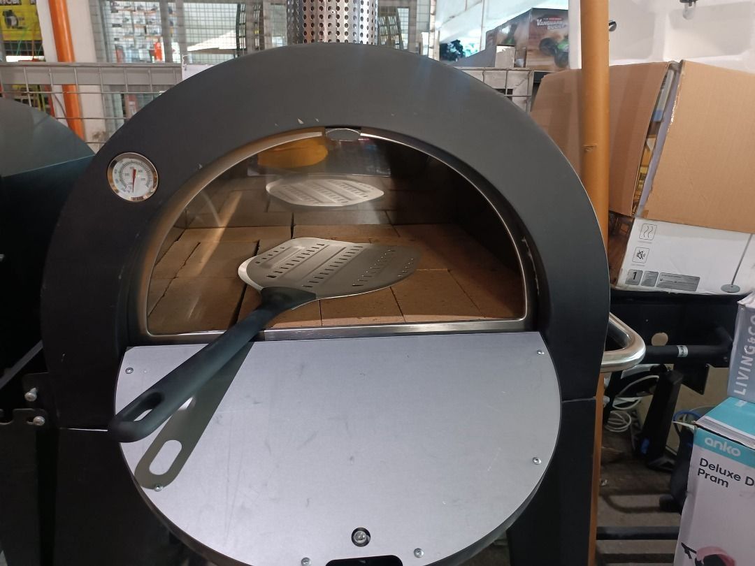 Matador Woodfired Pizza Oven (Category: Ovens & Toasters) located in Muntinlupa City. Submitted by aussie.surplustore (Listing ID 1336898066, Image 3). Description: Matador Woodfired Pizza Oven Available in 1 unit only. FEATURES: ✅ Adjustable chimney vent ✅ Trolley stand with wheels ✅ High temperature powder coated pizza oven surround and fascia ✅ Black powder coated side shelf ✅ Includes temperature gauge mounted in oven fascia Surplus from Aust