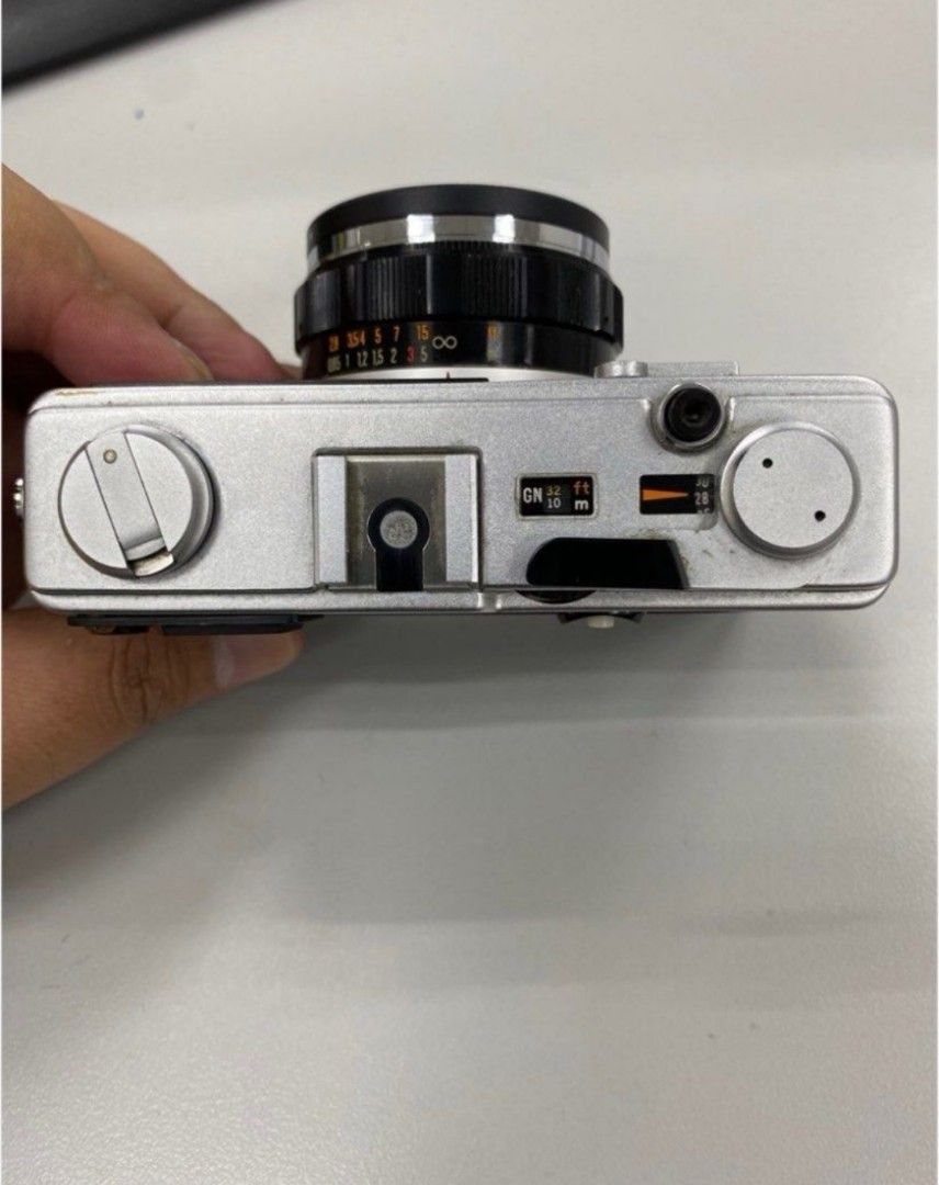 Olympus 35 DC + Spare Batteries (Category: Cameras) located in Quezon City. Submitted by userdomain (Listing ID 1336934161, Image 3). Description: Olympus 35 DC Film Camera Rangefinder type Included: Film filter from Toshiba Strap from Goache Two batteries (the spare: unused).