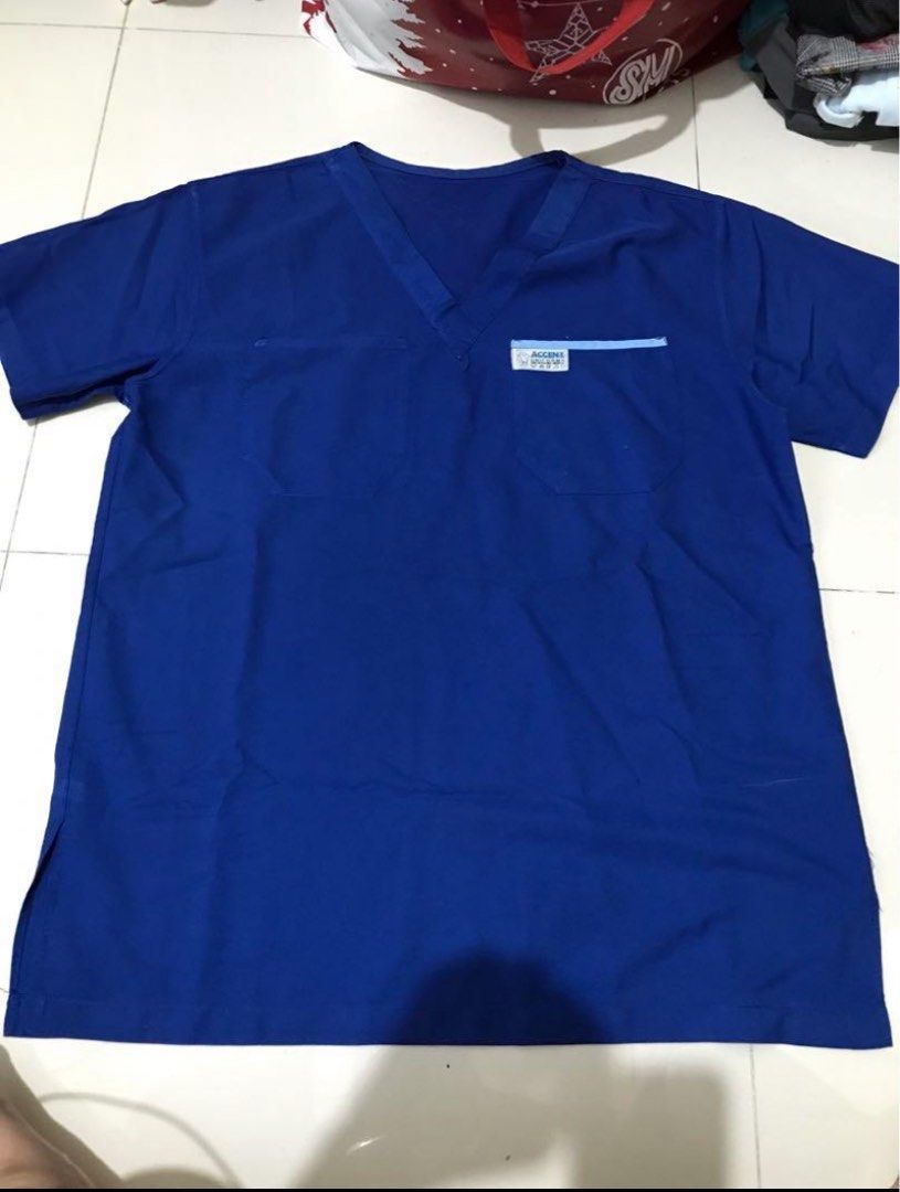 PLUS SIZE BLUE SCRUB TOP (Category: Tshirts & Polo Shirts ) located in Quezon City. Submitted by stefsm (Listing ID 1336897428, Image 1). Description: XXL-XXXL.