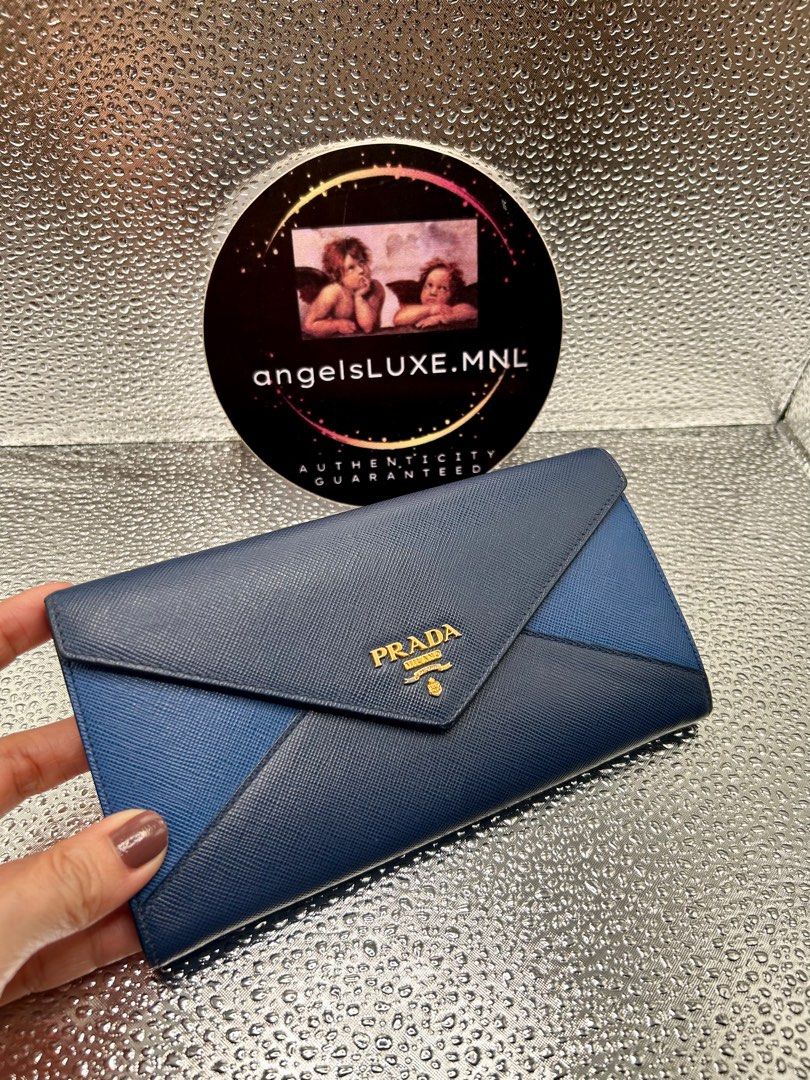 PRADA Blur Envelope 2 Tone Wallet (Category: Luxury Bags & Wallets) located in Pasig City. Submitted by angelsluxe.mnl (Listing ID 1336956599, Image 1). Description: New Arrival‼️ P.RADA Blur Envelope 2-Tone Wallet in Rank A Condition ☑️100% Authenticity guaranteed or your money back. ☑️On hand and ready to ship.