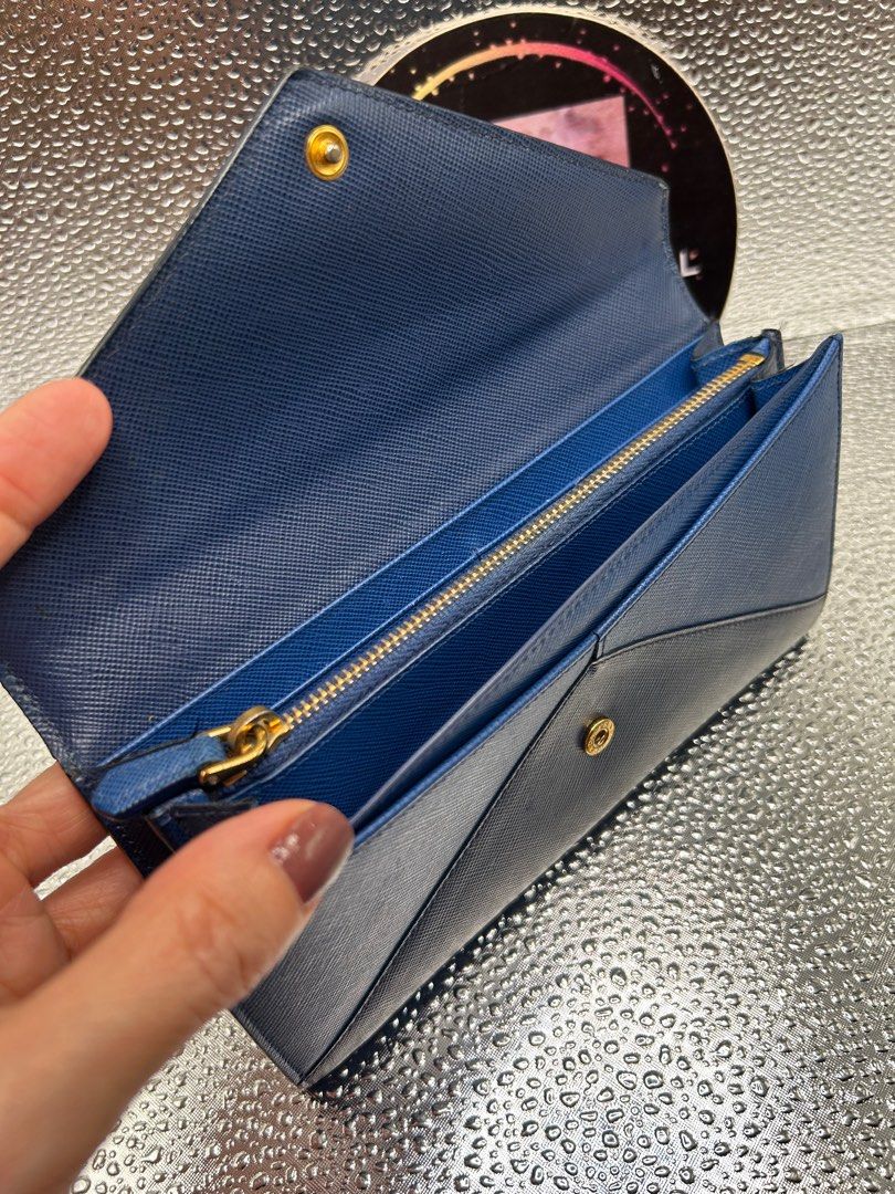 PRADA Blur Envelope 2 Tone Wallet (Category: Luxury Bags & Wallets) located in Pasig City. Submitted by angelsluxe.mnl (Listing ID 1336956599, Image 2). Description: New Arrival‼️ P.RADA Blur Envelope 2-Tone Wallet in Rank A Condition ☑️100% Authenticity guaranteed or your money back. ☑️On hand and ready to ship.
