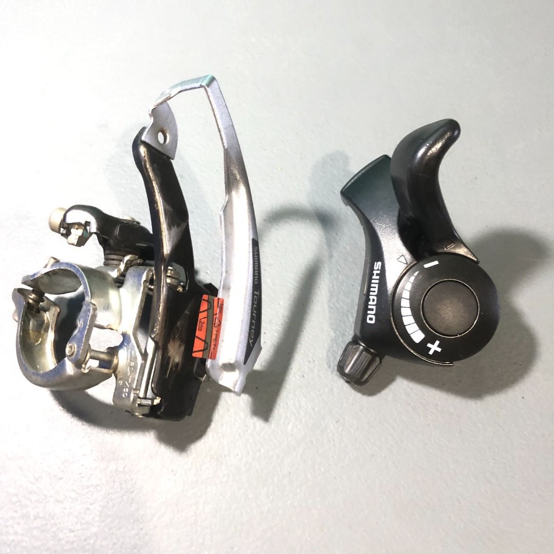 Shimano FD-TX50 Front Derailleur with Shifter (Category: Bicycles) located in Calamba. Submitted by tekky101 (Listing ID 1337031871, Image 2). Description: shimano Tourney FD-TX50 front derailleur with shifter included 3 speed, clamp diameter 34.9mm for 6,7,8 speed, suit for 42T Chain Ring, top pull Pickup Calamba only or ship via Lalamove or J&T. Buyer will shoulder the SF. PM or derecho msg na lang sa akin para mabilis usapan. .