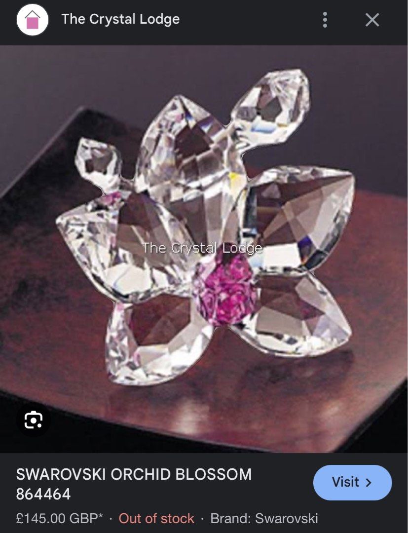 Swarovski Orchid Blossom (Category: Other Home Decor) located in Quezon City. Submitted by declutterwithj (Listing ID 1337029720, Image 2). Description: ₱10,000 or best offer Complete with box and certificate.