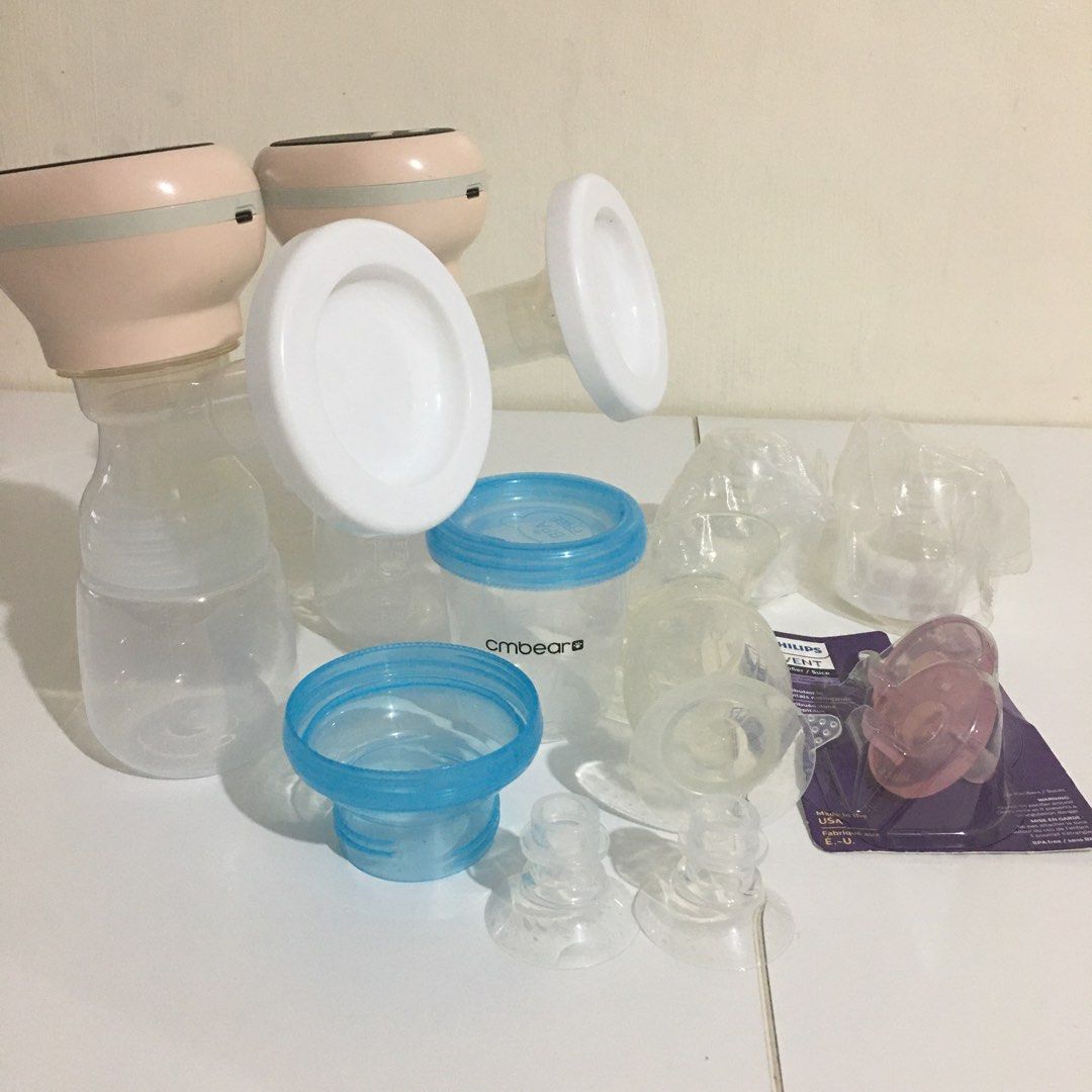 Electric Breastpump set with other essentials (Category: Breastfeeding & Bottle Feeding) located in Santa Rosa. Submitted by malindj (Listing ID 1337169451, Image 2). Description: Used for 4 months only as I prefer direct latch. Address: Santa Rosa Laguna Near: Enhanced Kingdom Set includes: 1 set electric breast pump 1 pc CMBear manual breast pump 1 pc CMBear milk container 2 pcs 15mm flange silicon insert 2pcs unused Avent pacifier 3-18mos.