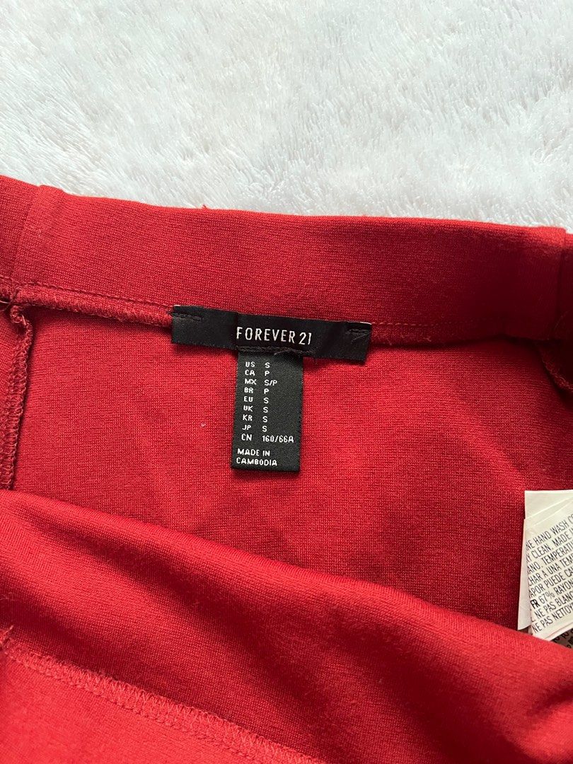 forever 21 red/orange skirt (Category: Skirts) located in Tuguegarao City. Submitted by orymiming (Listing ID 1337171516, Image 3). Description: size s.