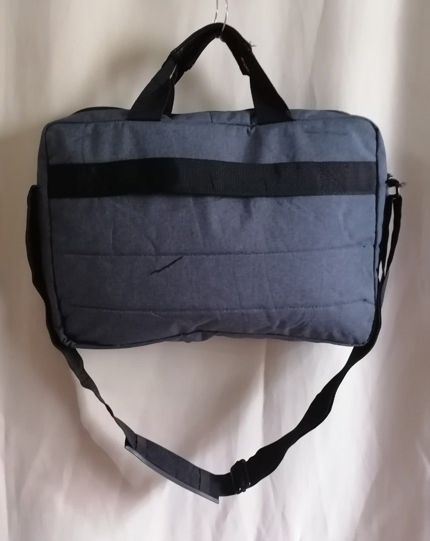 HP laptop bag (Category: Laptop Bags & Sleeves) located in Cagayan de Oro. Submitted by emma3782 (Listing ID 1337103153, Image 2). Description: In good condition No heavy flaws Dimensions: 11"h 15"w 2" base 3" handle 55" sling strap adjustable.
