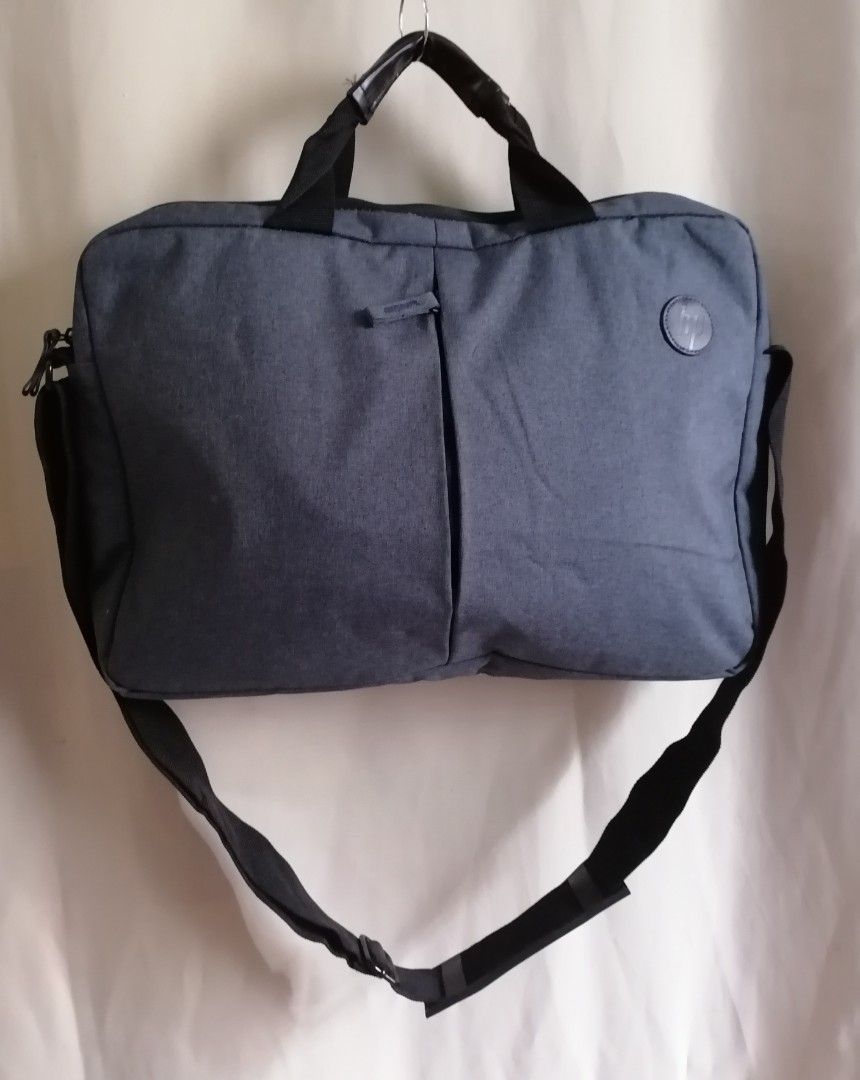 HP laptop bag (Category: Laptop Bags & Sleeves) located in Cagayan de Oro. Submitted by emma3782 (Listing ID 1337103153, Image 1). Description: In good condition No heavy flaws Dimensions: 11"h 15"w 2" base 3" handle 55" sling strap adjustable.