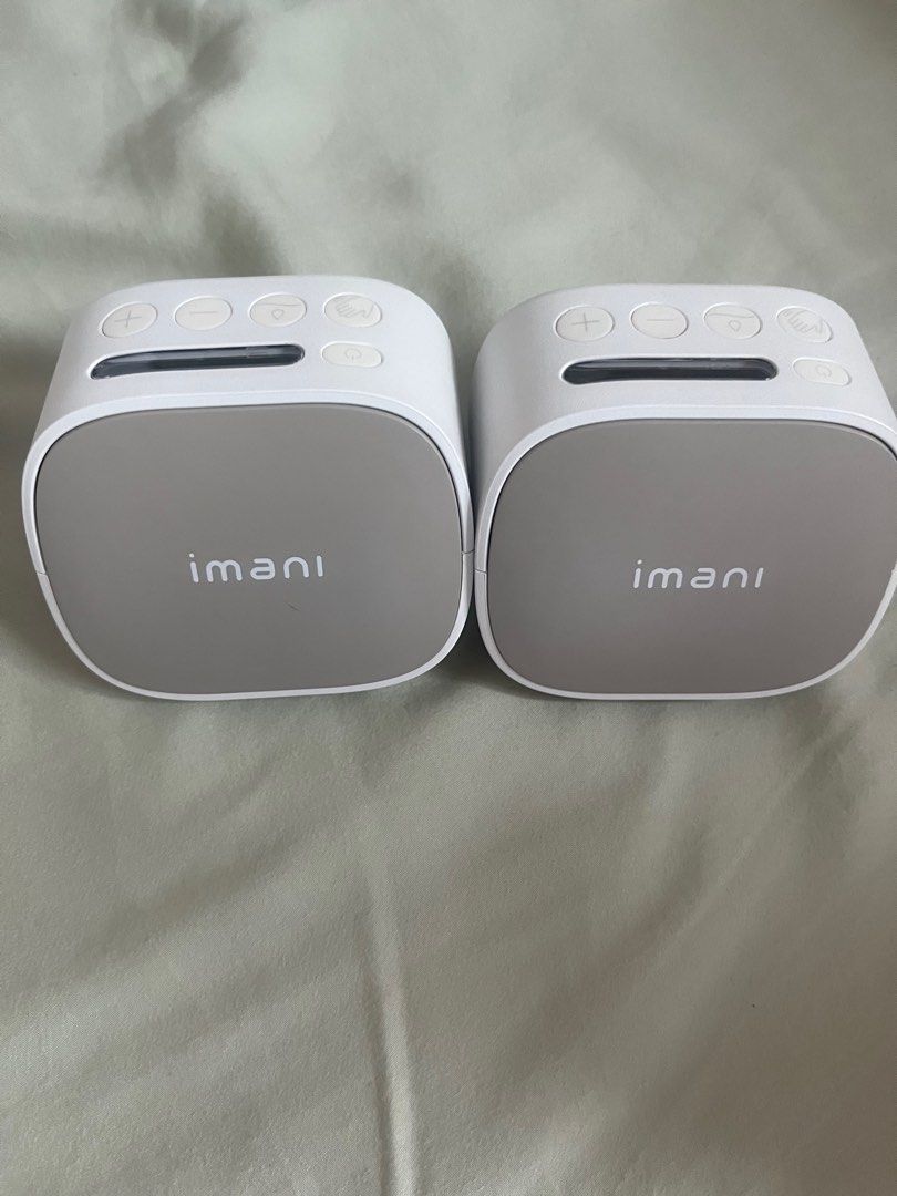 Imani pump (Category: Breastfeeding & Bottle Feeding) located in Singapore. Submitted by kittytrix (Listing ID 1337131321, Image 1). Description: Used less than 5 times. Come with box, pumps and cups.
