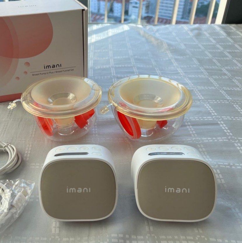 Imani pump (Category: Breastfeeding & Bottle Feeding) located in Singapore. Submitted by kittytrix (Listing ID 1337131321, Image 2). Description: Used less than 5 times. Come with box, pumps and cups.