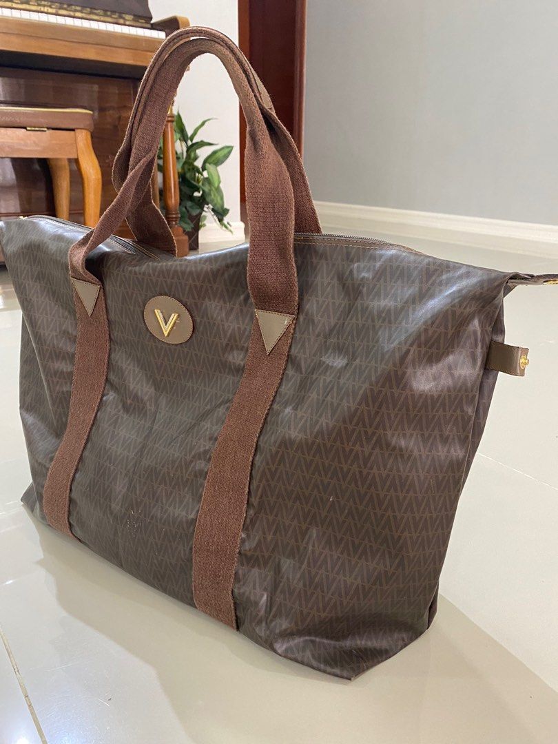 MARIO VALENTINO TRAVEL BAG (Category: Luxury Bags & Wallets) located in Dumanjug. Submitted by avegailbal20275 (Listing ID 1337097608, Image 2). Description: Used authentic Mario Valentino bag in good condition , large size..