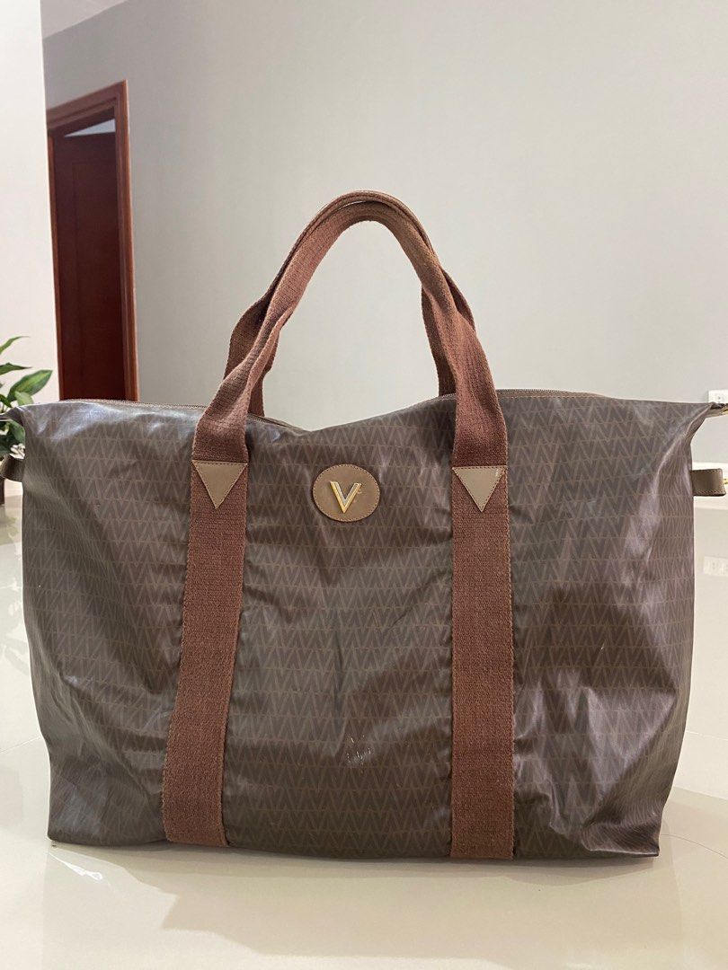 MARIO VALENTINO TRAVEL BAG (Category: Luxury Bags & Wallets) located in Dumanjug. Submitted by avegailbal20275 (Listing ID 1337097608, Image 1). Description: Used authentic Mario Valentino bag in good condition , large size..