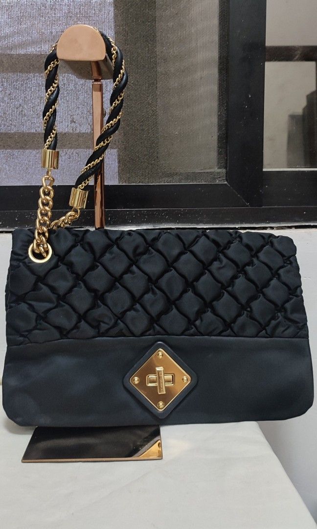 Moschino clutch bag sale shop