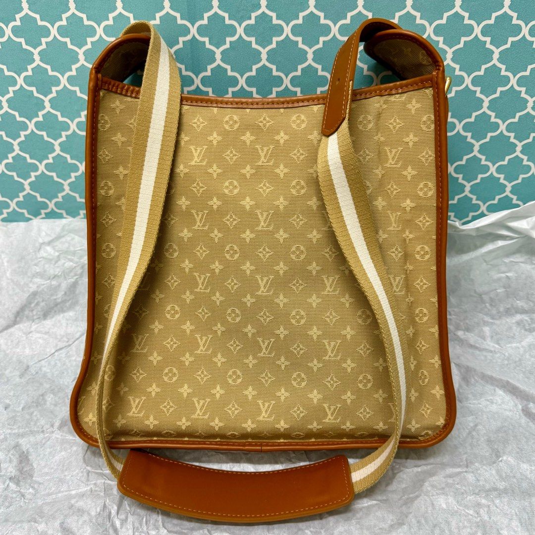 RARE FIND!! LV Mini Lin Caramel (Category: Luxury Bags & Wallets) located in Taguig. Submitted by anniething.goes (Listing ID 1337178170, Image 2). Description: MARKED DOWN PRICE!! Mint condition Rank A (9/10) Rare find!! GOOD DEAL!!! Mini lin in caramel Crossbody/shoulder bag with adjustable strap With minimal signs of use, small dirt marks inside but it comes with bag organizer No other inclusions! Guaranteed authentic!! All sales are final‼️ N