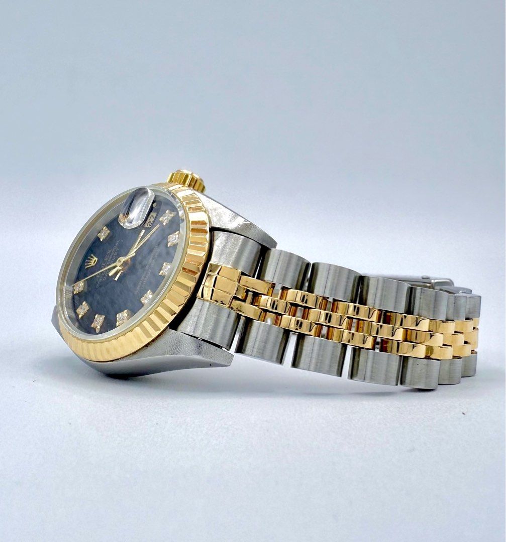 ROLEX Lady-Datejust [26mm] ♡ (Category: Luxury Watches) located in Paranaque City. Submitted by cityandsea (Listing ID 1337109229, Image 2). Description: ROLEX Lady-Datejust [26mm] ♡ 🏷️₱289,999 • Reference 69173 • Year 1993 • Black Dial with Big Diamonds • 18K Yellow Gold Two Tone Jubilee Bracelet • 18K Yellow Gold Fluted Bezel • Caliber 2135 • Automatic Movement • Sapphire Crystal Glass • Watch only [no card] • Condition: 9.8/10 • Inclusions: -