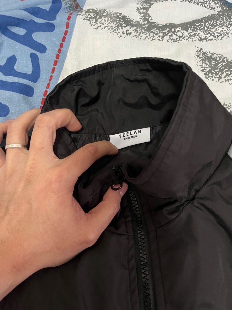 WindJacket Teelab Oversize Basic Logo Jacket (Category: Coats, Jackets and Outerwear) located in Singapore. Submitted by prawns123 (Listing ID 1337116424, Image 4). Description: Width 65cm Only used once during my overseas trip, not using anymore hence selling, as good as new!.