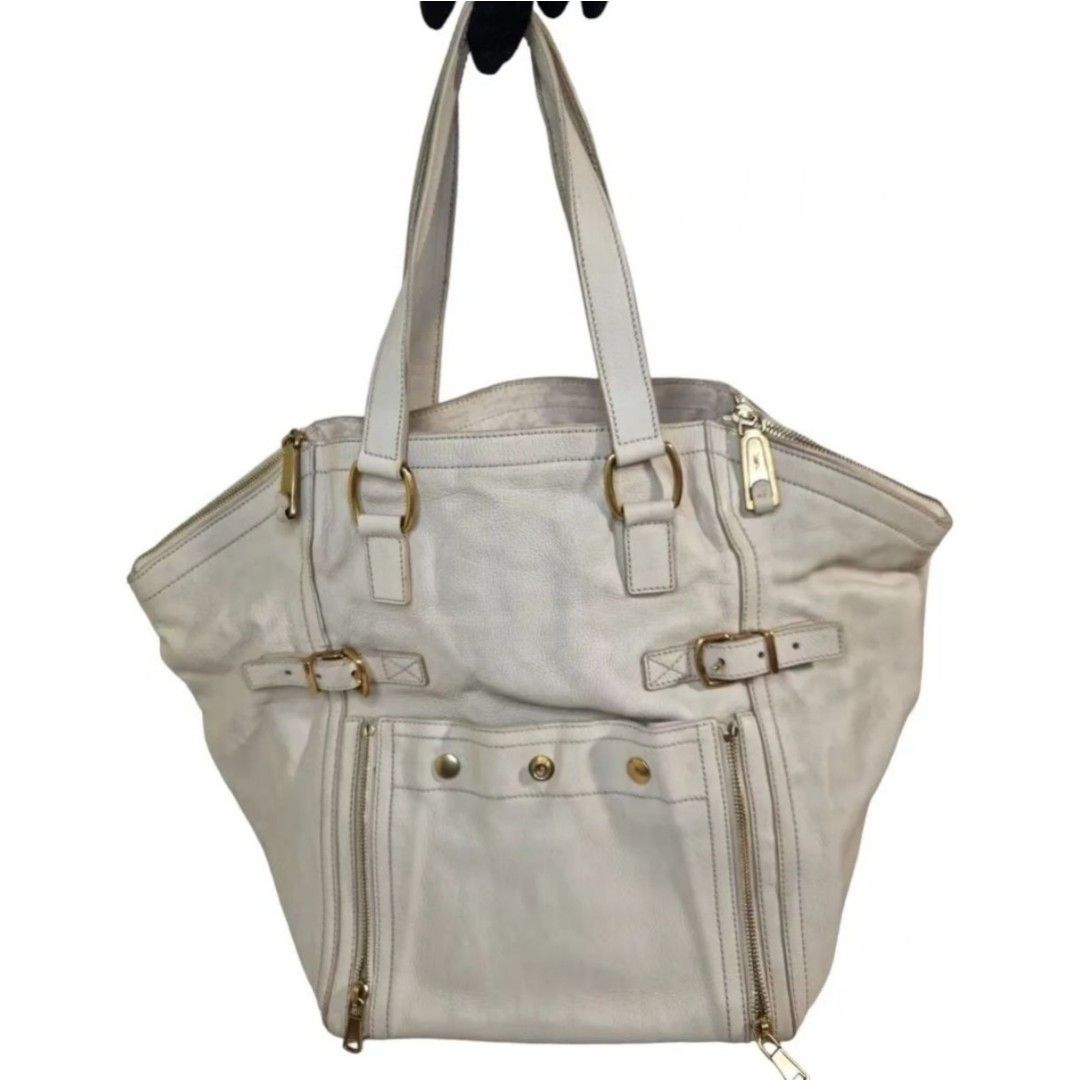 YSL DOWNTOWN (Category: Luxury Bags & Wallets) located in Quezon City. Submitted by maneradesignersboutique (Listing ID 1337107691, Image 1). Description: Money back Guarantee 💯% Guaranteed authentic *Brand: YSL DOWNTOWN *Materials: grained calfskin leather *Color: cream white *Size: small *Condition: 8/10 need spa -Used * Inclusions: dustbag All items purchased from manera has less 30% Discount in restoration lifetime. Rank review by the criter