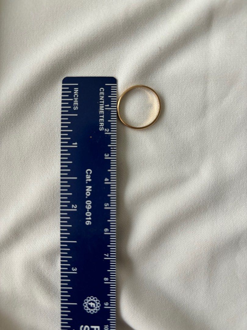 18k yellow gold Size 5 solid wedding band or simple band ring for stacking (Category: Rings) located in Dumaguete. Submitted by aldrinkimi (Listing ID 1334030215, Image 2). Description: Solid, 18k yellow gold, 1.1 grams, size 5, 2-3mm thick. Perfect as a wedding band or simple band for stacking. So romantic in actual!.