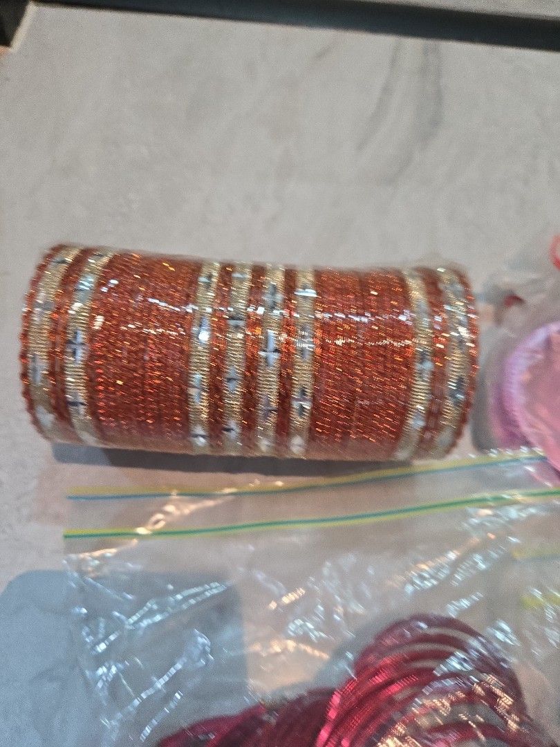 Bangles (Category: Bracelets) located in Singapore. Submitted by sumithakanthaguru (Listing ID 1334137938, Image 6). Description: many different colours size 28 aluminium bangles no glitter on all except one (orange set) red maroon royal blue light gold gold green mint green royal purple orange light purple pink silvery gold.