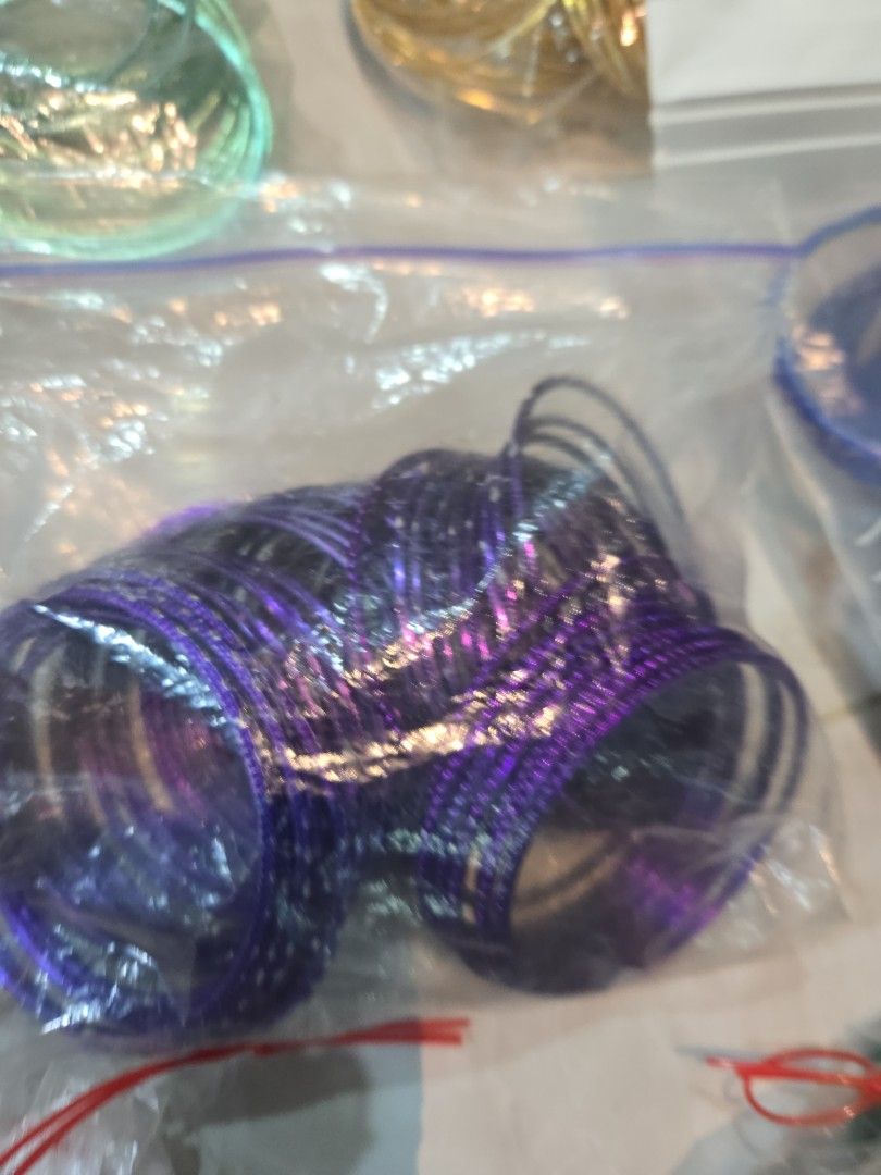 Bangles (Category: Bracelets) located in Singapore. Submitted by sumithakanthaguru (Listing ID 1334137938, Image 9). Description: many different colours size 28 aluminium bangles no glitter on all except one (orange set) red maroon royal blue light gold gold green mint green royal purple orange light purple pink silvery gold.