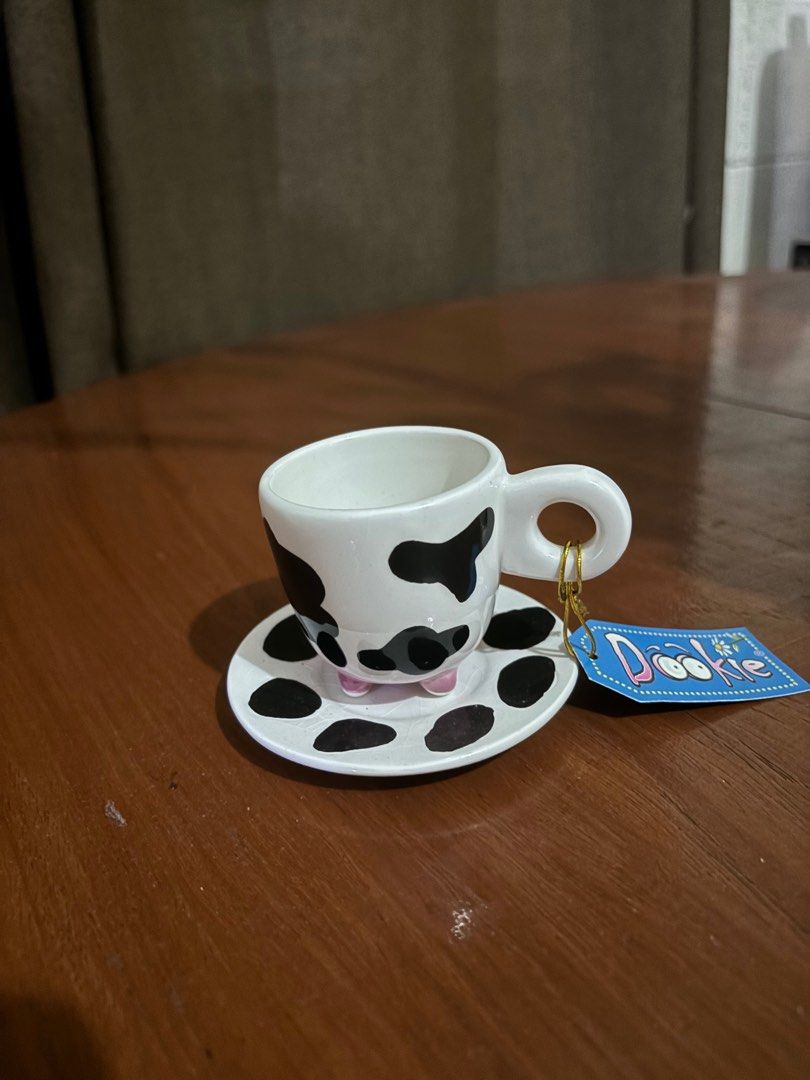 Cow print cup and saucer set (Category: Coffee & Tea Tableware) located in Quezon City. Submitted by steffo_declutters (Listing ID 1334104665, Image 1). Description: .