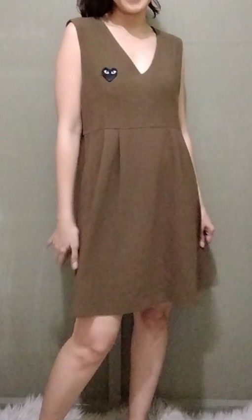 Empire Mini Dress (Category: Dresses) located in Cebu City. Submitted by laganda (Listing ID 1334133216, Image 2). Description: no flaws fits M-L ( bust 36" Waist 34" length 32") model size M, height 5"1'.