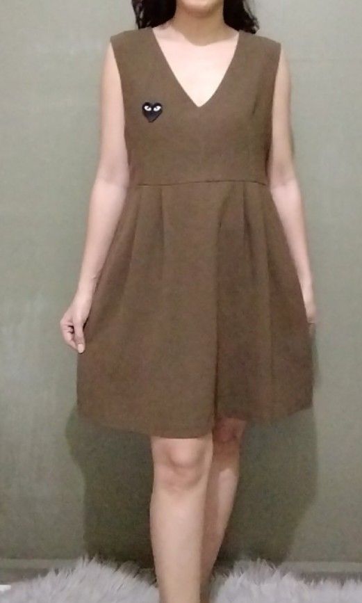 Empire Mini Dress (Category: Dresses) located in Cebu City. Submitted by laganda (Listing ID 1334133216, Image 1). Description: no flaws fits M-L ( bust 36" Waist 34" length 32") model size M, height 5"1'.