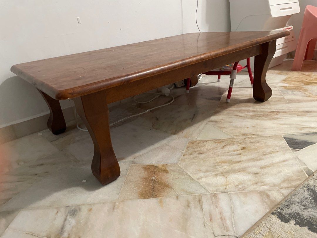 Solid wood table (Category: Tables & Sets) located in Ampang. Submitted by swiftgem_37e75b (Listing ID 1334141076, Image 2). Description: Somewhat antique as this table has been used since in 90s Was used as study table with siblings.