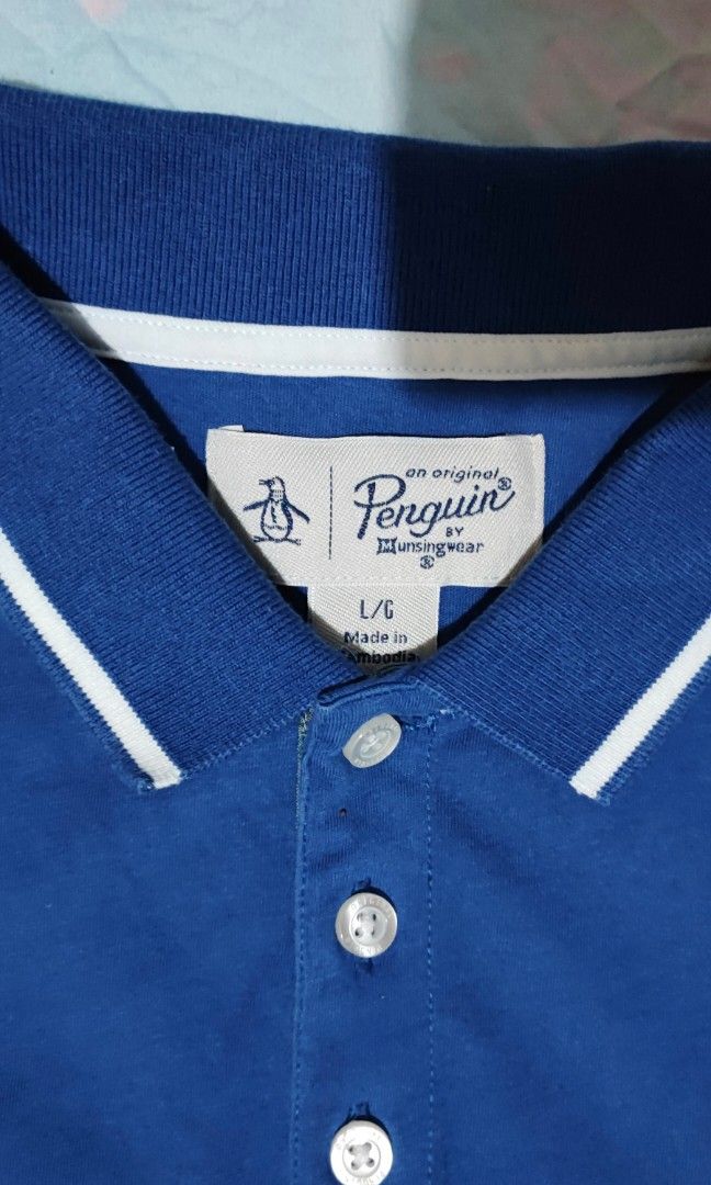 ORIGINAL PENGUIN (Category: Tshirts & Polo Shirts ) located in Taguig. Submitted by adejesus21 (Listing ID 1334127069, Image 2). Description: 100% AUTHENTIC ORIGINAL PENGUIN SIZE LARGE ON TAG DIMENSION - 22 WIDTH 28 LENGHT COLOR - ROYAL BLUE CONDITION - AS NEW 9.8/10 PRICE - P1,699 SHIPPED LOCATION - TAGUIG MODE OF PAYMENT - GCASH / METROBANK.