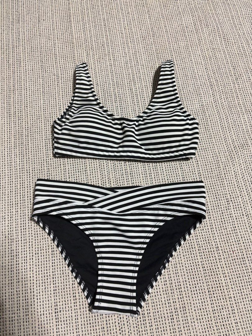 Black & White Swimsuits (Category: Bikinis & Swimsuits) located in Manila. Submitted by dzone.declutter (Listing ID 1334109392, Image 1). Description: Size XS-S Bra pads included Owner size reference Bust - 32A Waist - 26-27” Bought from Fishermall Dept Store Location: Sampaloc, Manila Decluttering and doesn’t fit anymore.