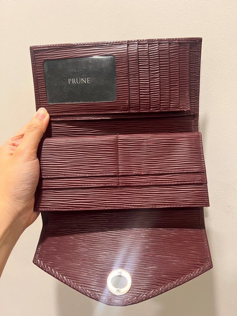 Prune Wallet - Burgundy (Category: Wallets & Card holders) located in Manila. Submitted by jennystuff (Listing ID 1334107094, Image 1). Description: Bought in Argentina during a business trip. Prune is one of the leading leather shop in Argentina. Good quality. Wallet is well used which is seen on the picture but doesn’t affect the functionality of it. It was kept in the cabinet but you can still smell the leather of it. .