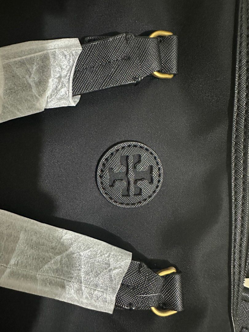 Tory Burch Sling Tote Bag (Category: Cross-body Bags) located in Manila. Submitted by bajec (Listing ID 1334139232, Image 3). Description: Selling this brand new tory burch sling tote bag in color black. Bought for 3500 pesos from an ig seller based in vietnam. .