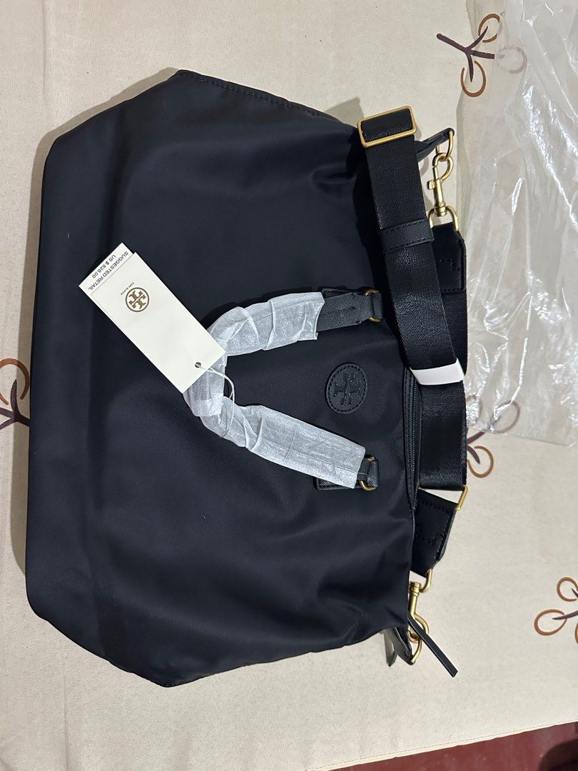 Tory Burch Sling Tote Bag (Category: Cross-body Bags) located in Manila. Submitted by bajec (Listing ID 1334139232, Image 1). Description: Selling this brand new tory burch sling tote bag in color black. Bought for 3500 pesos from an ig seller based in vietnam. .