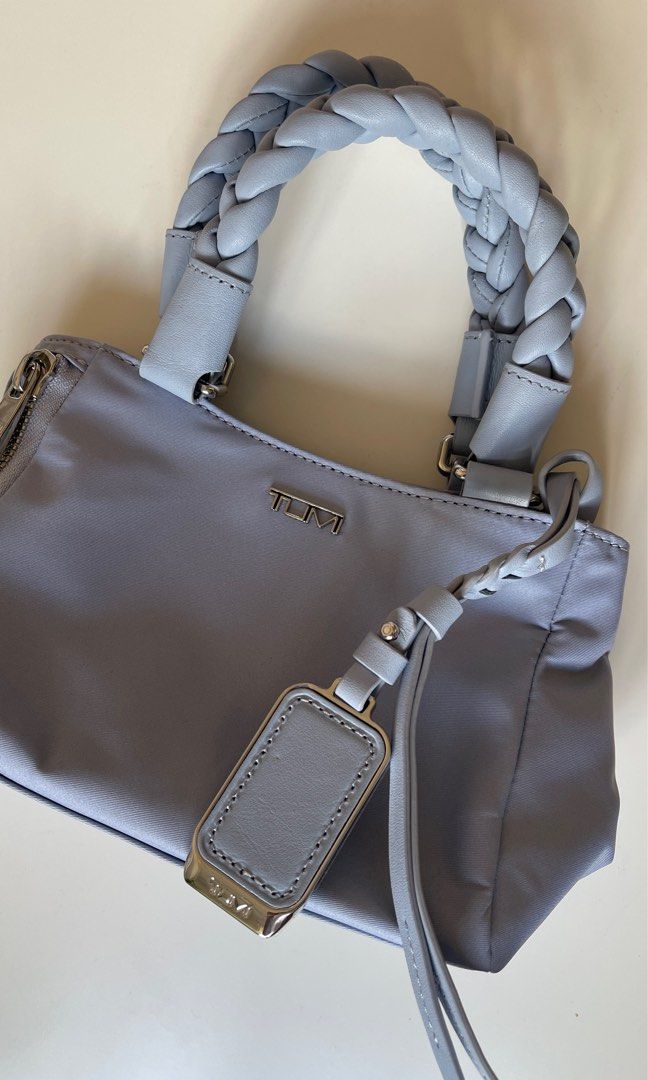 TUMI Voyageur Valetta Micro Tote (Category: Luxury Bags & Wallets) located in Pasig City. Submitted by declutterrrsale (Listing ID 1334020779, Image 1). Description: This was a gift and never used. Store Price is P27K, selling for only 11K. Great deal. Specifications in the photos.