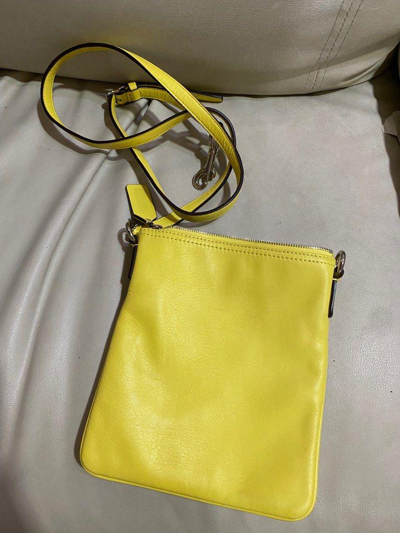 AUTHENTIC Coach Yellow Mini Messenger Crossbody Bag (Category: Luxury Bags & Wallets) located in Quezon City. Submitted by closetofcoco (Listing ID 1337277010, Image 2). Description: GUARANTEED AUTHENTIC PM FOR INQUIRIES NO LOW BALLING.