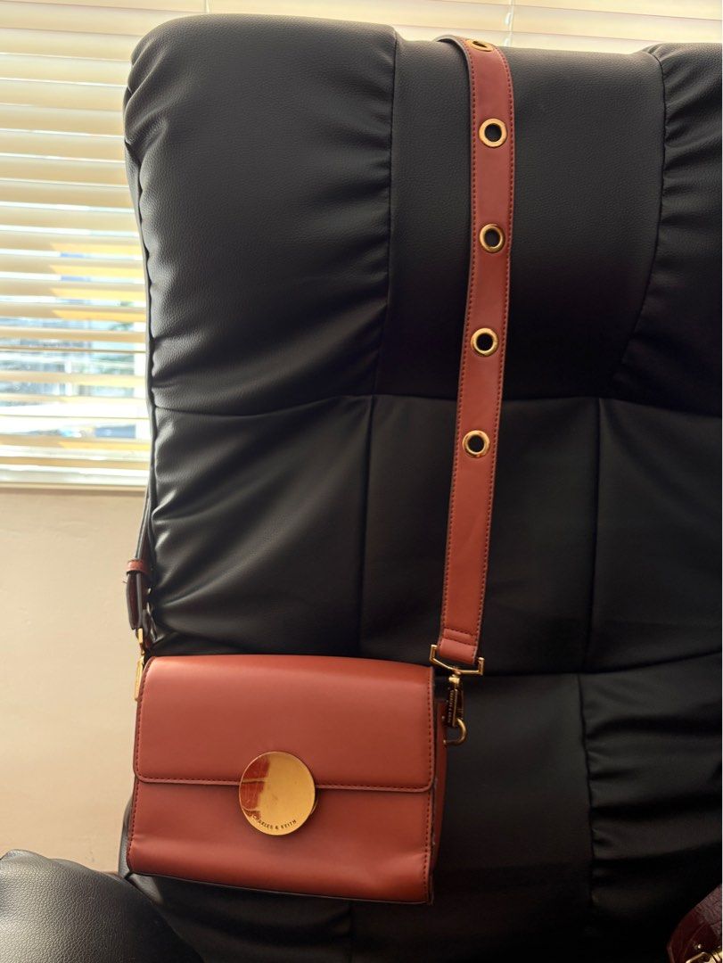 Charles & Keith Sling/Cross body bag (Category: Cross-body Bags) located in Rodriguez. Submitted by declutterwithshals. (Listing ID 1337271243, Image 2). Description: Condition: 8/10 Metallic accent push lock Flaws shawn in photos Rfs: No longer using it Note: actual color of the product may slightly vary from the color of this photo due to lighting .