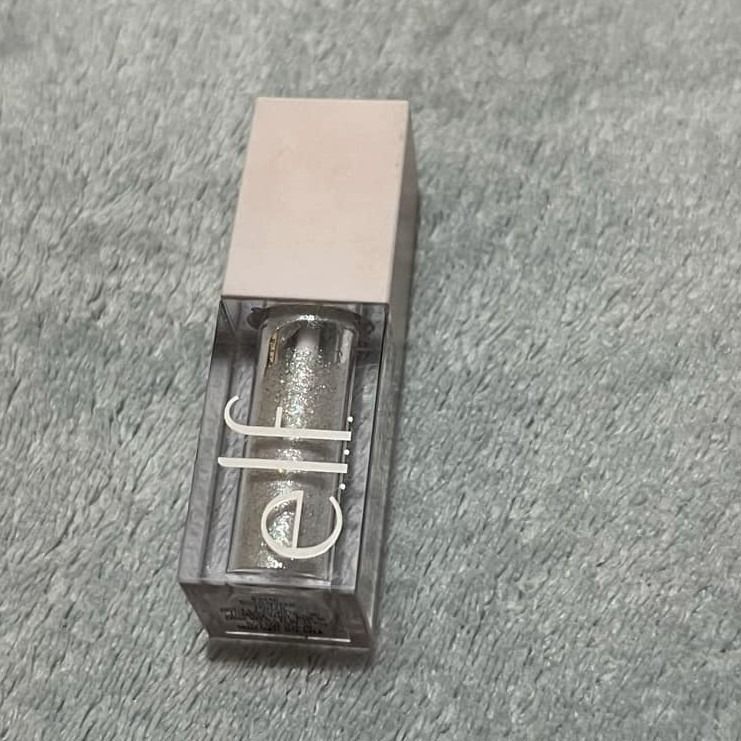ELF LIQUID GLITTER EYESHADOW (Category: Makeup) located in Mandaluyong City. Submitted by emmugh (Listing ID 1337252037, Image 1). Description: rfs: used it once for concert makeup then didn't need it again.