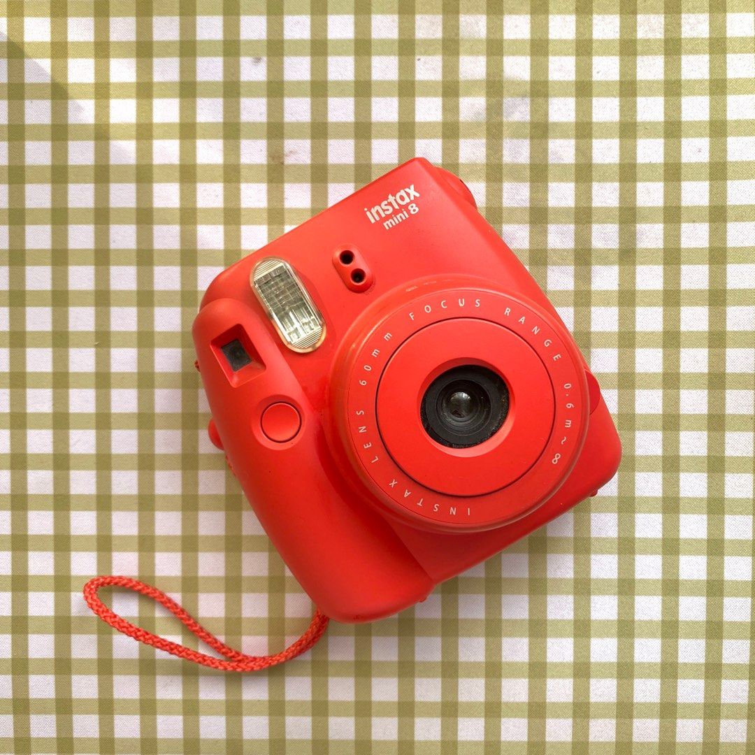 For Sale: Instax Mini 8 ! Read Description ! (Category: Cameras) located in Manila. Submitted by eygee. (Listing ID 1337306599, Image 1). Description: Selling my Fujifilm Instax Mini 8 in Red Condition: The camera produces dark outputs, likely due to something partially blocking the lens. This seems to require manual adjustment of the lens before taking pictures, and it does work after adjusting. I recently realized this issue when someone shared